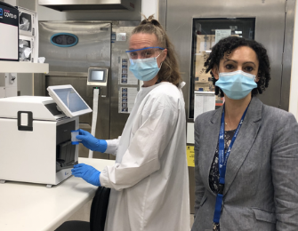 Nicole Isles and Associate Professor Maryza Graham at work in the Microbiological Diagnostic Unit Public Health Laboratory in Melbourne